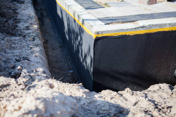 Professional Exterior Waterproofing technician working in Morrice, MI